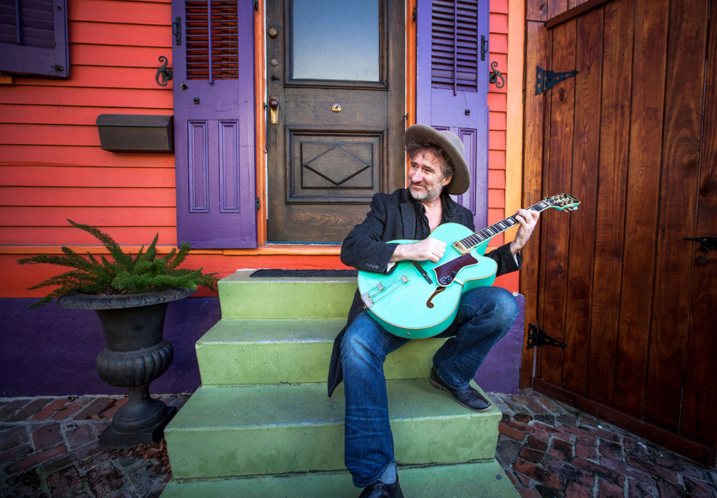Jon Cleary Playing Guitar New Orleans Stairs